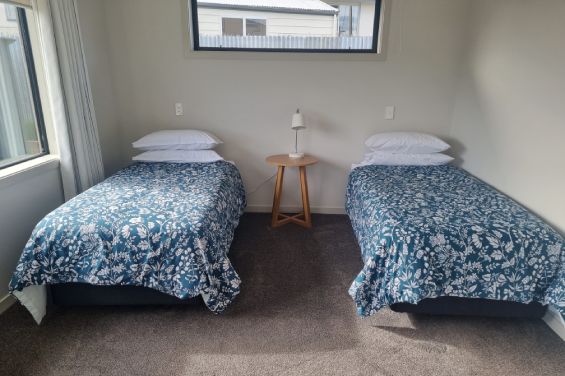 Jafa's Holiday House main bedroom with split beds